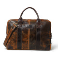 Tan and dark brown leather briefcase with handles and shoulder strap.