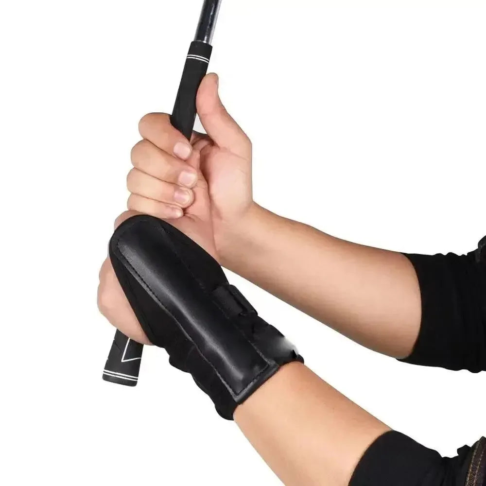 Black PGM golf swing wrist strap trainer.