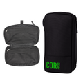 Black COR Surf compact toiletry travel bag shown closed against a white background.